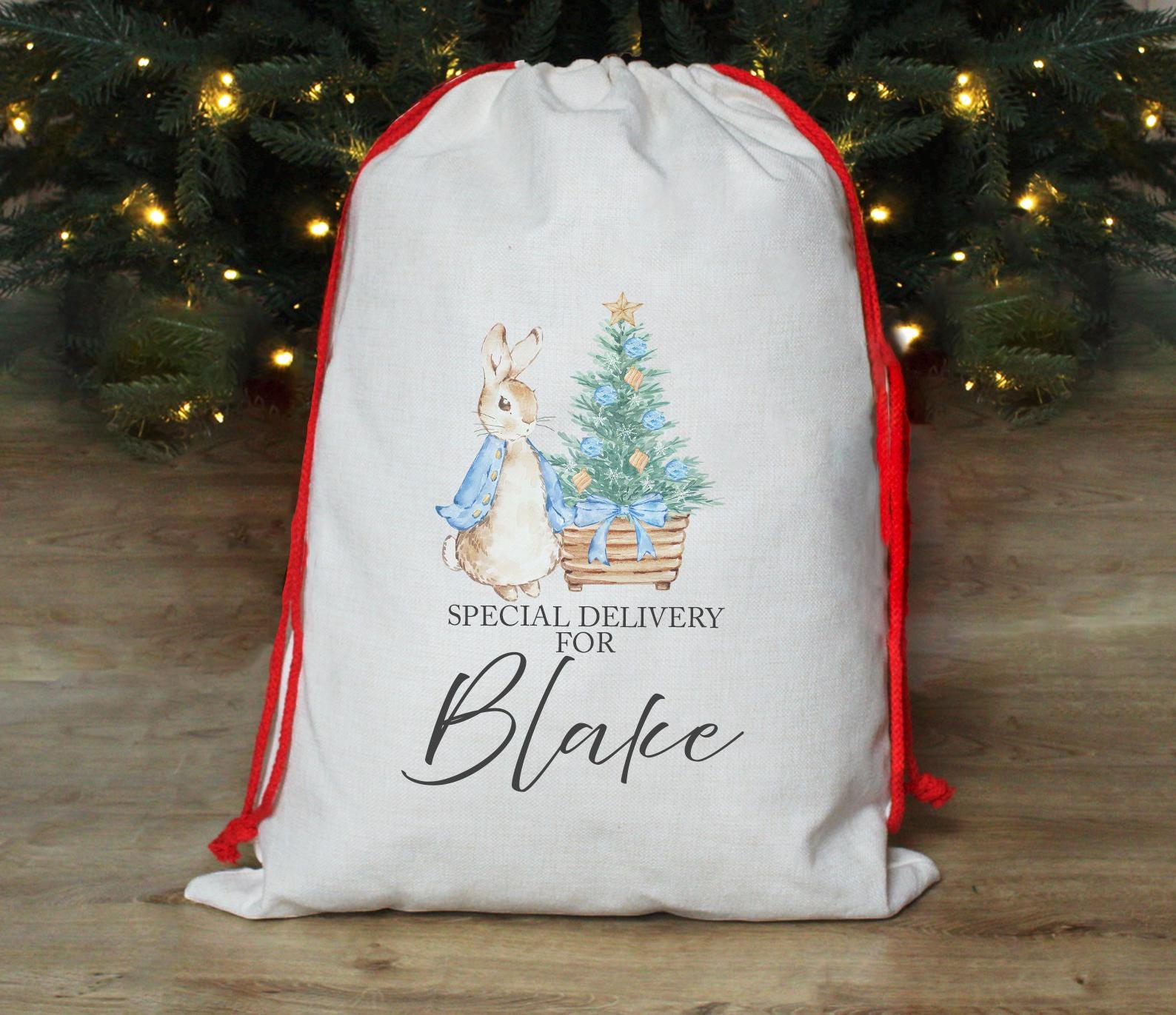 Personalised special delivery boy blue raabit gift sack, christmas eve box, personalised santa sack, first christmas gift, first christmas