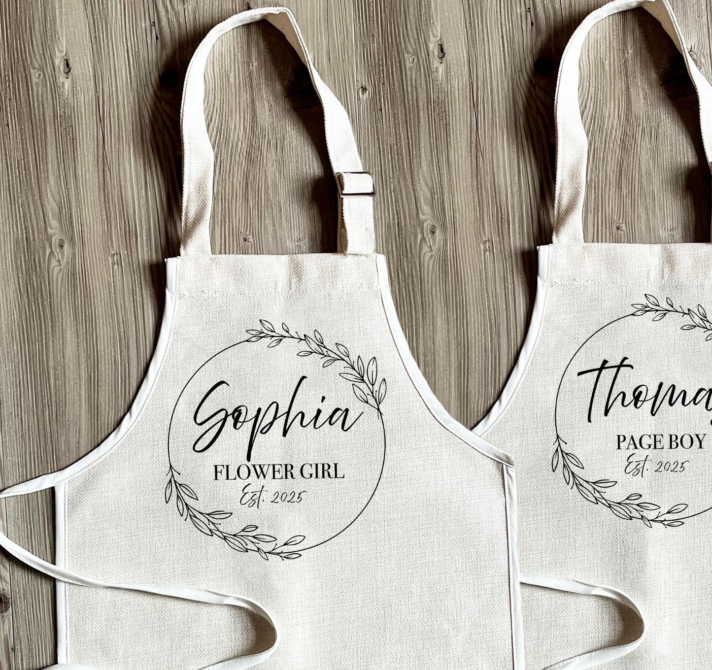 Personalised flower girl black wreath apron, Personalised bridesmaid black wreath apron, Personalised page boy black wreath apron